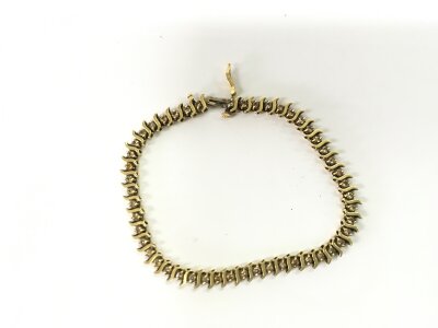 A 14ct gold bracelet. 9.86g