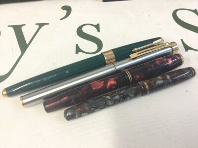 Four vintage pens . Parker , Burnham , Sheaffer