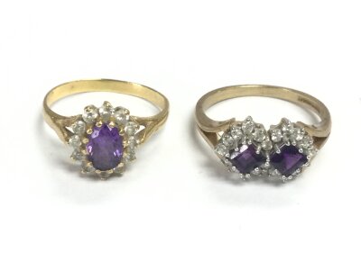 One 18ct gold ring 3.45g size N and one 9ct gold ring 3.3g size P set with stones.