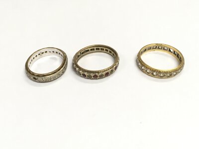 9ct gold eternity rings and an 18ct one.