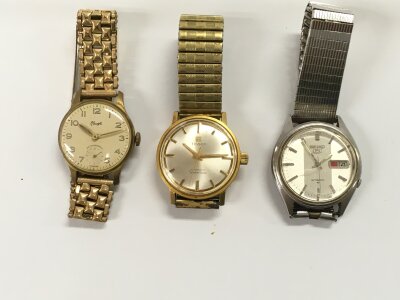 Three vintage watches including a Seiko Tissot and Kienzle