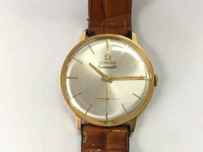 An 18ct gold cased Omega Seamaster watch. Approximately 36mm case.
