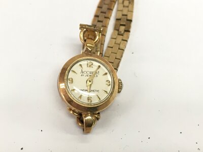 A 9ct gold ladies accurist watch. 14.80g