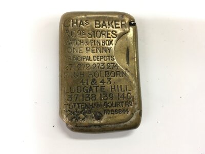 A Chas Baker and sons brass match and pin box.