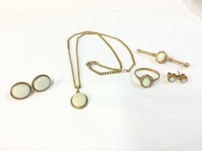 A collection of opal set jewellery including earrings, necklace, ring, brooch etc. 13g