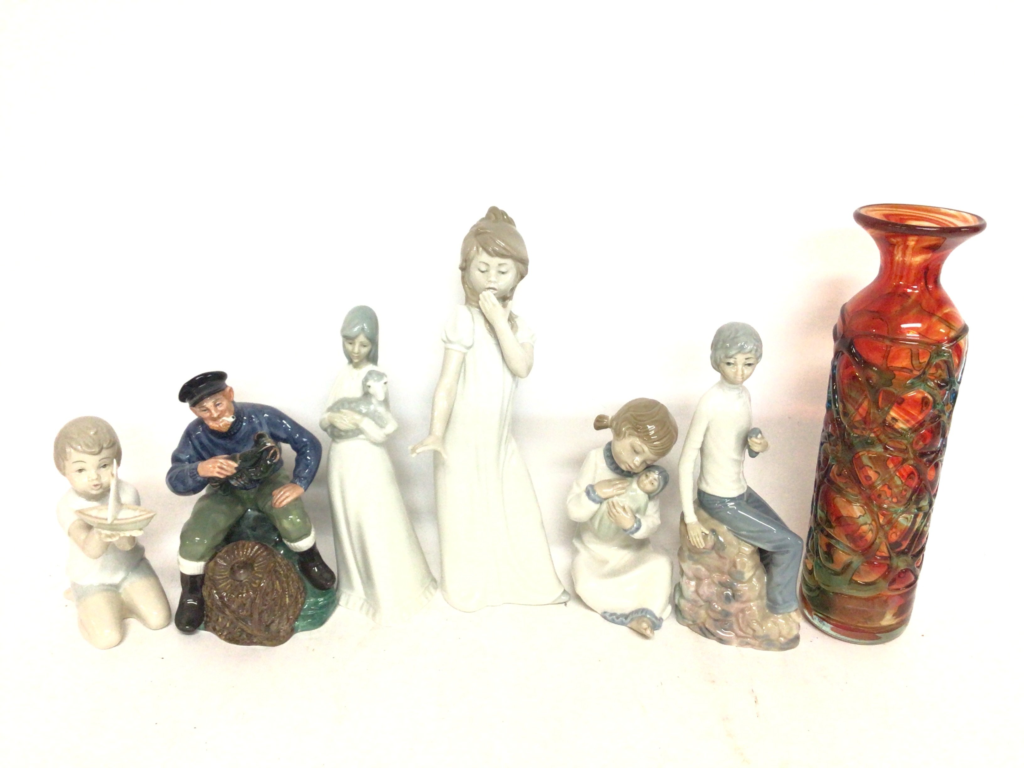 A Royal Doulton Figure, Neo figures and a coloured art vase . Postage cat D