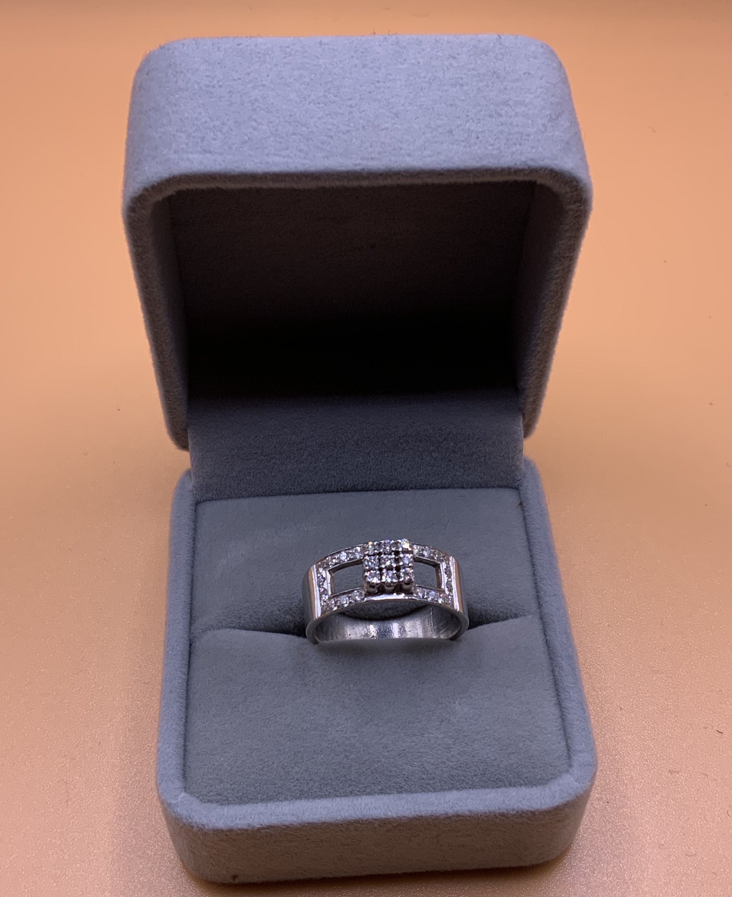 A heavy platinum and 0.53 cluster diamond ring. Size R, 10.4g. (A)