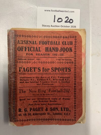 1921 - 1922 Arsenal Football Handbook: Fair condition with staple failing leaving centre page loose and cover detached. Celotaped spine and corners rounded.