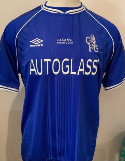 Chelsea 2000 FA Cup Final Football Shirt: Excellent condition original replica home shirt with tags. Above Autoglass sponsorship is FA Cup Final Wembley 2000. Size large.