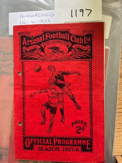 1927 - 1928 Arsenal v Huddersfield Town Football Programme: For the match played on 14 4 1928. Rusty staples holding firm. No writing but punch holes.
