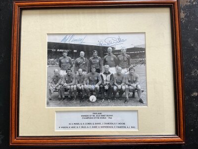 England 1966 World Cup Signed Team Group: Full team pictured with Shepherdson before the 1985 Bradford fire disaster Charity match v West Germany. Fully signed by all the 11 winning players plus Alf Ramsey. Picture is 8 x 6 inches then has been mounted and framed.