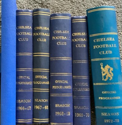 Chelsea Bound Volumes Of Football Programmes: First team homes with covers bound for seasons 59/60 unofficial then 4 official binders from 66/67 to 69/70. C/W official binder with programmes from season 72/73. Please note we checked for 69/70 postponed programmes but they were not included. (6)