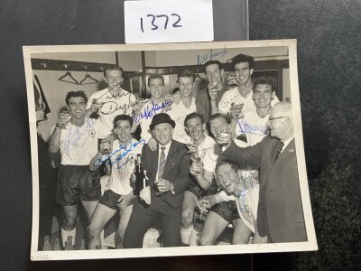 Tottenham Double Season Signed Football Press Photo: 8 x 6 inch black and white photo with press stamp to rear. Players all holding a glass to celebrate. Obtained directly from someone that used to arrange dinners in their honour. Signed by Dyson Jones Brown Norman Henry Medwin Blanchflower Nicholson Mackay and Smith.