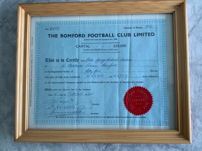 Romford Football Memorabilia: Framed 1965 share certificate which can be easily removed, 47/48 handbook and Sporting Mirror article, Director + Wifes official pass for 72/73, 3 different local leagues handbooks. 1911 Squirrels Heath team group postcard. Romford disbanded in 1911 and it is thought some players played for Squirrels Heath.