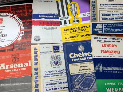 Football Programme Boxes: Includes replica pre war cup finals, Colchester United 70s + 80s, quantity of 60s programmes with name written to cover, European finals, fixture cards, late 50s/rarly 60s Derby homes, 1953 England v Scotland pirate, Inter League, 1956 2012 Olympics, Internationals, testimonials, puzzles, phonecards and much more. Instructions to sell. (2 boxes)