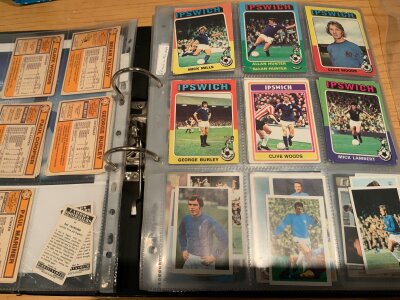 Ipswich Town Football Cards + Memorabilia: Quantity of cards neatly displayed in collectors folder to include A+ BC, Barretts, FKS, Topps and others. C/W season tickets, credit cards, key rings, phone cards, cloth badges and 9 programme binders.