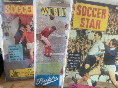 Football Memorabilia Boxes: Includes 65 magazine which are Soccer Stars World Soccers Shoot and more. Complete 1998 England World Cup coin set, Esso club badges, sticker albums, Sun stamp album and much more. Instructions to sell. (2 boxes)