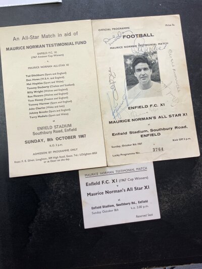 1967 Maurice Norman Tottenham Signed Testimonial Memorabilia: Enfield X1 v Maurice Normans All Stars programme ticket and advertisement. Programme is signed by 26 and the ticket is signed by 5. Autographs include John Charles, Finney Medwin Howe Ditchburn Hurst Robertson Knowles Jones Brown Wright and Mackay.