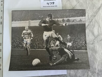 Bobby Moore West Ham Signed Press Photo: 10 x 8 black and white with press stamp and annotations from a 1965 match at Arsenal. Signed by Moore and opponents Sammels and Baker.