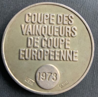 Paul Madeley Leeds United 1973 ECWC Football Medal: One side depicts the European Cup Winners Cup above the UEFA initials. The reverse states Coupe Des Vainqueurs De Coupe Europeenne 1973. COA from Pauls son.