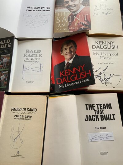 Signed Football Books: Black Hammers signed by 9 black West Ham players which have some stuck in autographs. Books with autographs directly into book include West Ham managers signed by Bonds, Di Canio and Jim Smith. Some others are signed by the author. (16)