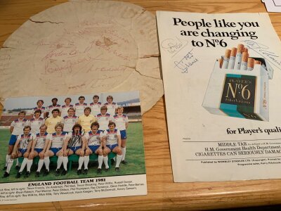 Signed Football Memorabilia: Torn paper plate signed to rear by Bobby Moore Gordon Banks Bobby Charlton Phil Beal Geoff Hurst Pat Crerand and a dedicated Rodney Marsh. Lots of other old autographs either signed to an autograph page or magazine picture. Includes a page signed by England players T Francis R Clemence and P Neal and a small 1981 postcard signed by Keegan McDermott and Wilson. Instructions to sell.