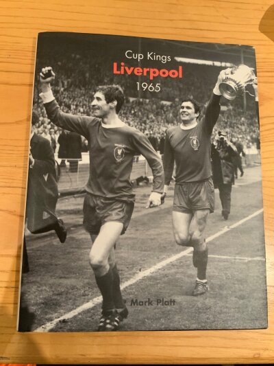 Liverpool 1965 FA Cup Winners Signed Book: Cup Kings Ltd edition 792/1000 hand signed by all 11 that beat Leeds in the FA Cup final. Includes Hunt St John Thompson Callaghan etc. As with all these page is lightly stuck into book and could be removed for a display.