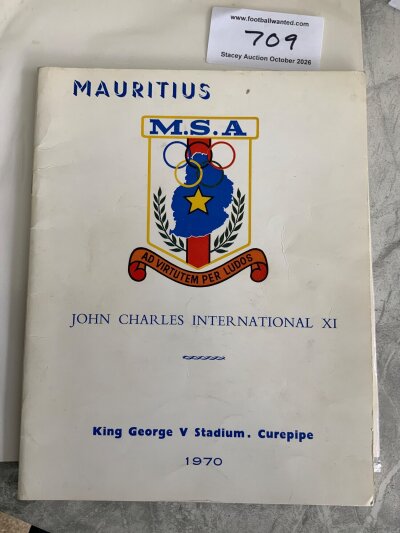 John Charles X1 1970 Signed Football Programme: Played in Mauritius consisting of players mainly that John played with both at club and international level. Clear autographs inside next to pen pictures to include Dudley Tyler Alan Jones Alec Carson Bill Dodgin Bobby Ferguson (Cardiff) John Bird John Davies John Charles Len +  Ivor Allchurch and John Shepherd.