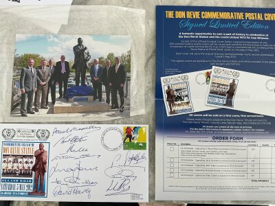 Leeds United Don Revie Statue Signed FDC: 2012 unveiling of the statue first day cover signed by 10 including Charlton Harvey Reaney Hunter Madeley Jones etc. C/W info about the cover and pictures of the players at the unveiling. C/W a signed magazine picture of Bremner and Revie.
