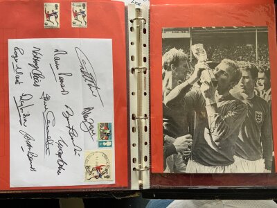 1966 World Cup Fully Signed England Football Autographs: Folder containing page signed by 10 of the winning team plus a photo of Bobby Moore kissing the World Cup which is hand signed to make all 11. C/W World Cup Willie 7 inch record and an England rosette and FDC,
.