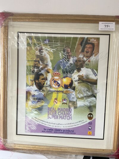 Real Madrid Legends Signed Football Prints: 2003 poster advertising Real Madrid v Teamthai for the Asia tour match. Picture features Beckham Figo Carlos Zidane Raul and Ronaldo and is signed by all. Expensively framed measuring 21 x 23 inches. C/W a signed print of Di Stefano Gento and Puskas from reputable Palomares of the 3 players with a poster of a 1962 fixture v Manchester United. Also an unframed 20 x 16 signed print of Figo. (3)