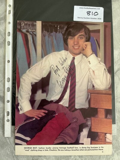 George Best Manchester United Signed Football Picture: Full size colour magazine picture of Best looking smart in his fashion shop in Cheshire. Clearly hand signed best wishes without dedication.