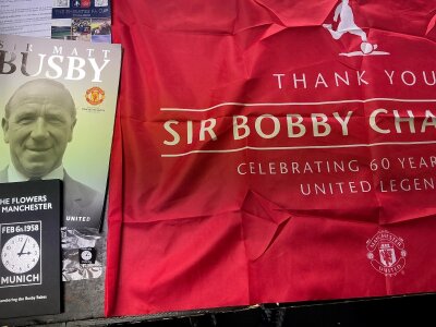 Manchester United Football Memorabilia: Includes Bobby Charlton and 2013 Champions flags, 2016 FA Cup final programme + ticket, annuals and more. Instructions to sell.