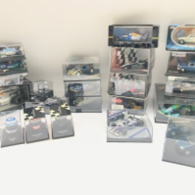 A Collection of Various Racing Car Models Including Minichamps Helmet Collection . All Renault.