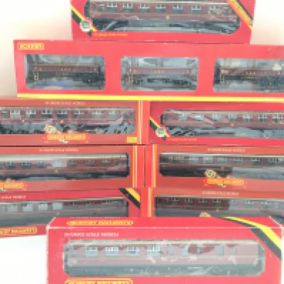 A Collection of Boxed Hornby 00 Gauge Coaches and Rolling Stock.