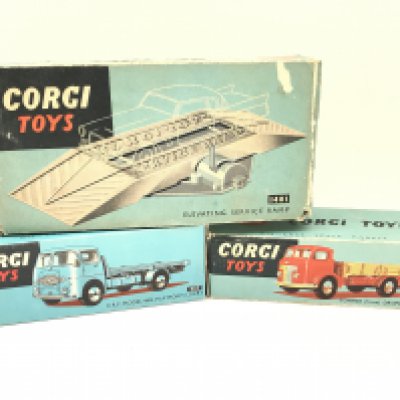 A Boxed Corgi E.R.F Model 44G Platform Lorry #457. A Commer (5Ton) Dropside Lorry #452 and an Elevating Ramp #1401 a/f. No Reserve.