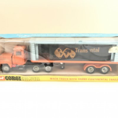 A Boxed Corgi Mack Truck With TransContinental Trailer #1100. Box Is Worn. No Reserve.