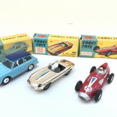 A Boxed Corgi Austin A.40 Saloon #216. A E Type Jaguar #312. And a Vanwall F1 Racing Car #150S.