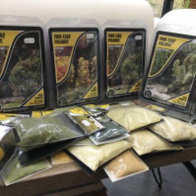 A collection in excess of 25 new sealed Woodland Scenics modelling accessories including trees..grasses etc. no reserve