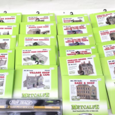 A collection of Metcalfe Card Construction kits all unopened in 00 scale. Includes Bank ..shop..farm building..railway bridge etc. also includes Tidy Track Rail Tracker cleaning kit suitable for various gauges. No reserve