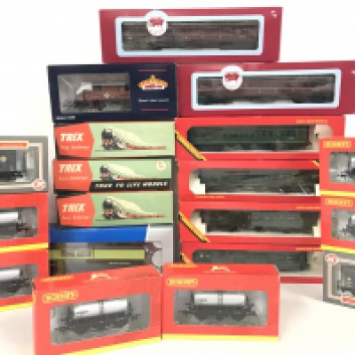 A Collection of Boxed And Loose 00 Gauge Wagons and Coaches.