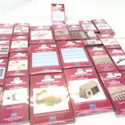 A collection of 25 new unopened PECO scenic series models in 00 scale for creating model railway layouts. No reserve