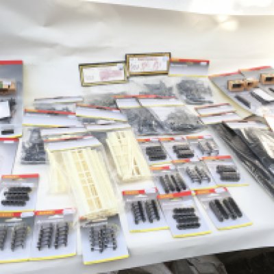 A collection in excess of 35 new unopened model railway accessories in OO gauge mainly by Hornby. Includes scene buildings and Loco wheel sets.