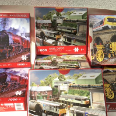 A collection of 14 new 1000 piece jigsaw puzzles by Hornby. No reserve