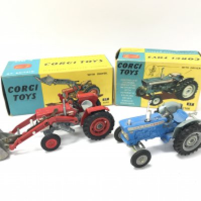 A Boxed Corgi Massey-Ferguson 65 Tractor With Fork #57 and a Ford 5000 Super Major Tractor #67. No Drivers.