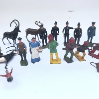 A Collection Of Vintage Britains Figures including Police men. Indians.et.
