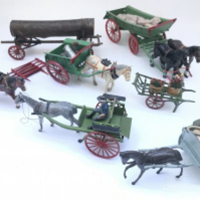 A Collection of Vintage Britains Horses and Wagons.