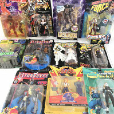 A Collection of Carded Figures Including Ultraforce. Predator. Mars Attacks. Etc. No Reserve.