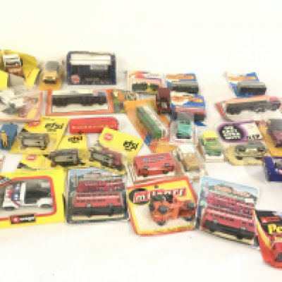 A collection of approximately 35 model vehicles mostly in original packaging . Manufacturers include Matchbox..Efsi..ERTL..Burago..Corgi plus others. No reserve.
