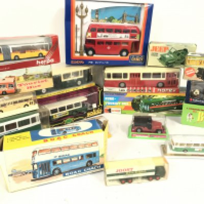 A Collection of Boxed Diecast and Plastic Buses and Jeeps. No Reserve.
